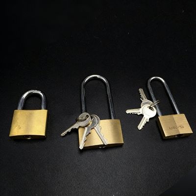 Three brass padlocks with keys, displayed on a black background, representing reliable and secure locking solutions. Ideal for home, office, and personal safety applications.