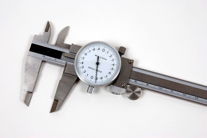 Precision measurement caliper for accurate sizing and monitoring technical specifications.