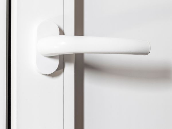 Clean white modern door handle for home or office; sleek and minimalist design enhances interior aesthetics and functionality.