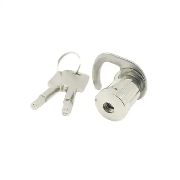 Secure commercial freezer lock cylinder with key for enhanced safety.