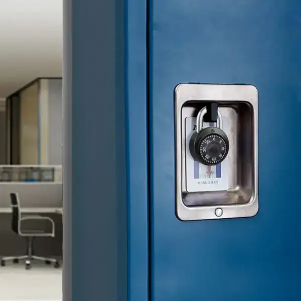 Close-up of a black dial combination lock securing a blue gym or school locker, emphasizing safety and security for personal belongings.