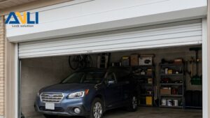 Close-up of ANLI LOCK garage door lock system installed on a garage door, showcasing its security features and design.