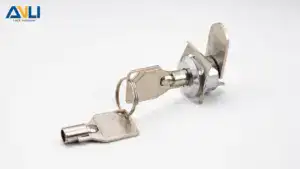 Close-up of an ANLI lock with a key and mounting plate, showcasing durable metal construction for security applications.