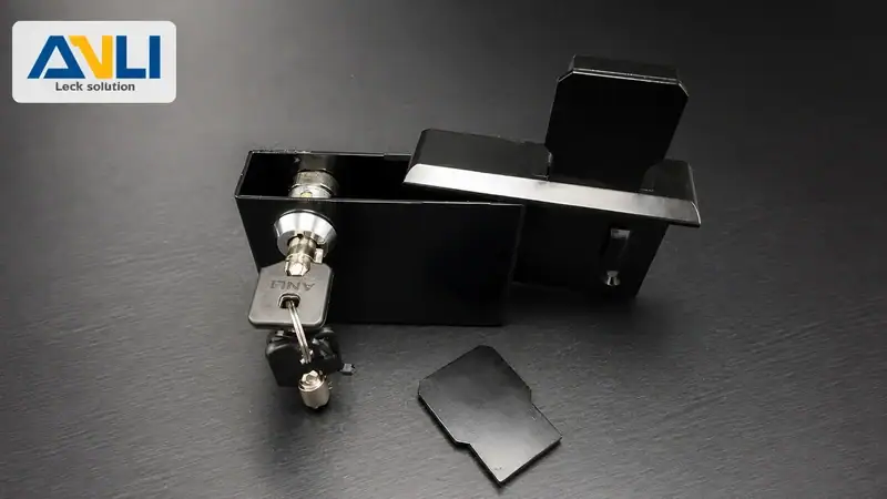 Close-up of ANLI LOCK, a high-security padlock with a black body and silver shackle, showcasing its robust design and locking mechanism.